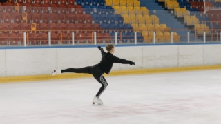 woman in black jacket and black pants skating